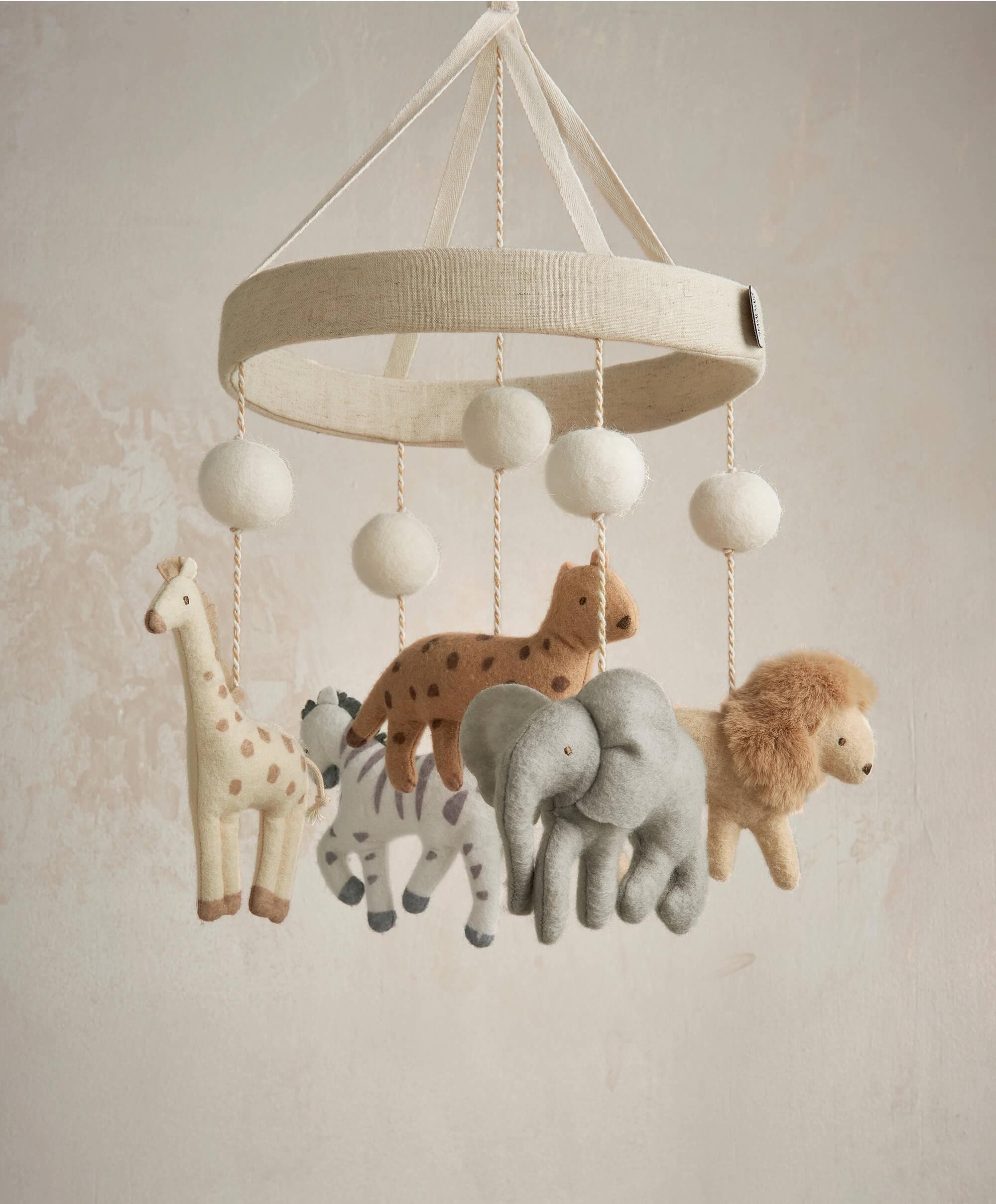 Mamas & Papas Born to be Wild Cot Mobile with playful animal designs.