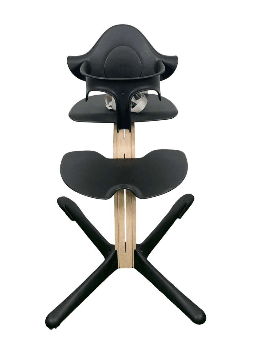 Stokke Nomi High Chair in Black/Natural, modern design for family dining.