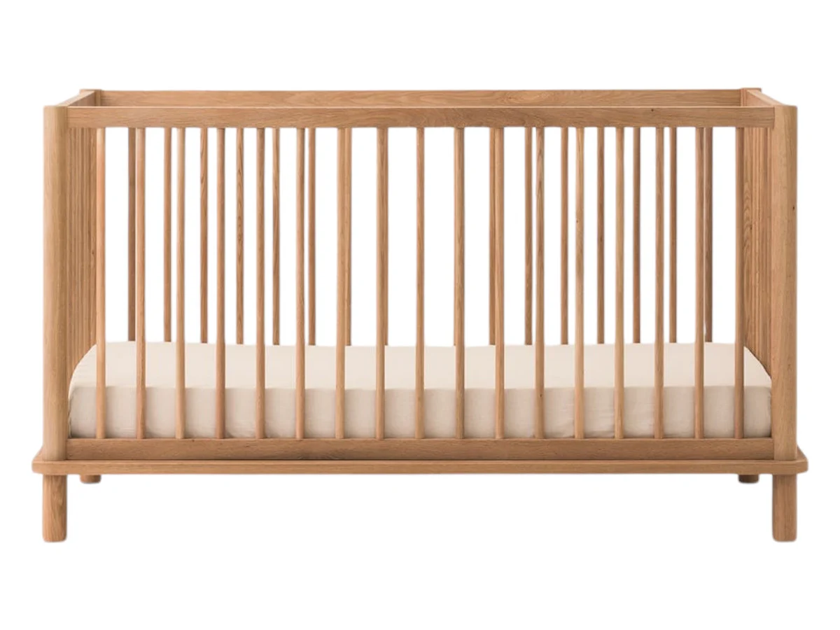 Nobodinoz Latitude Evolving Cradle in a serene nursery setting.