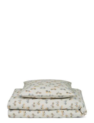 Liewood Carmen Baby Bedding Print in soft sandy colors with playful patterns.