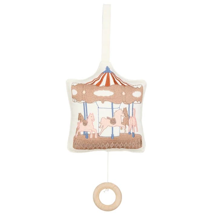 Cam Cam Copenhagen music mobile in soft colors for a nursery.