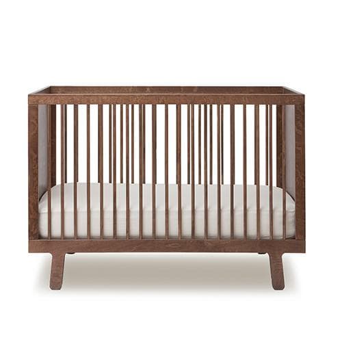 Sparrow babybed Oeuf NYC in walnut finish.