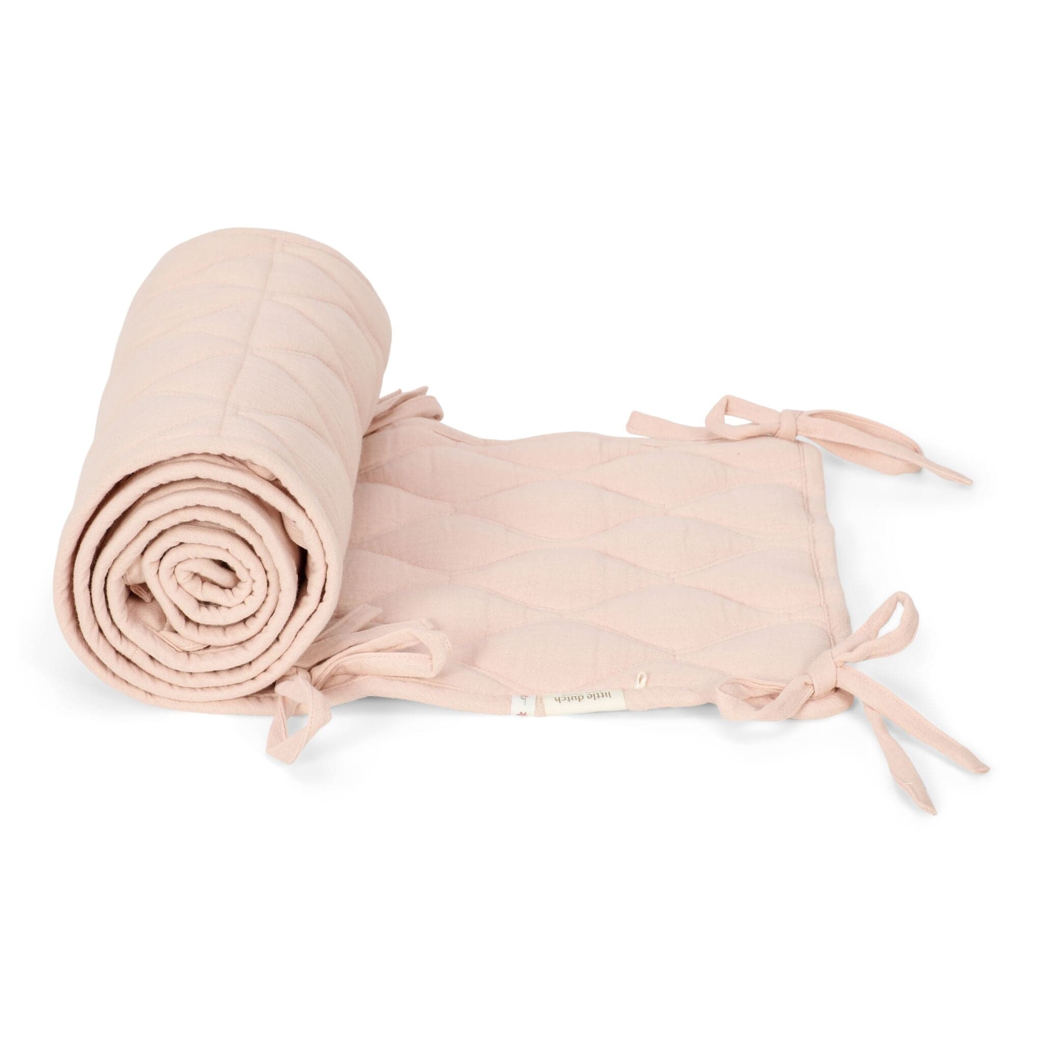 Little Dutch Crib Bumper in pink, designed for safety and comfort.