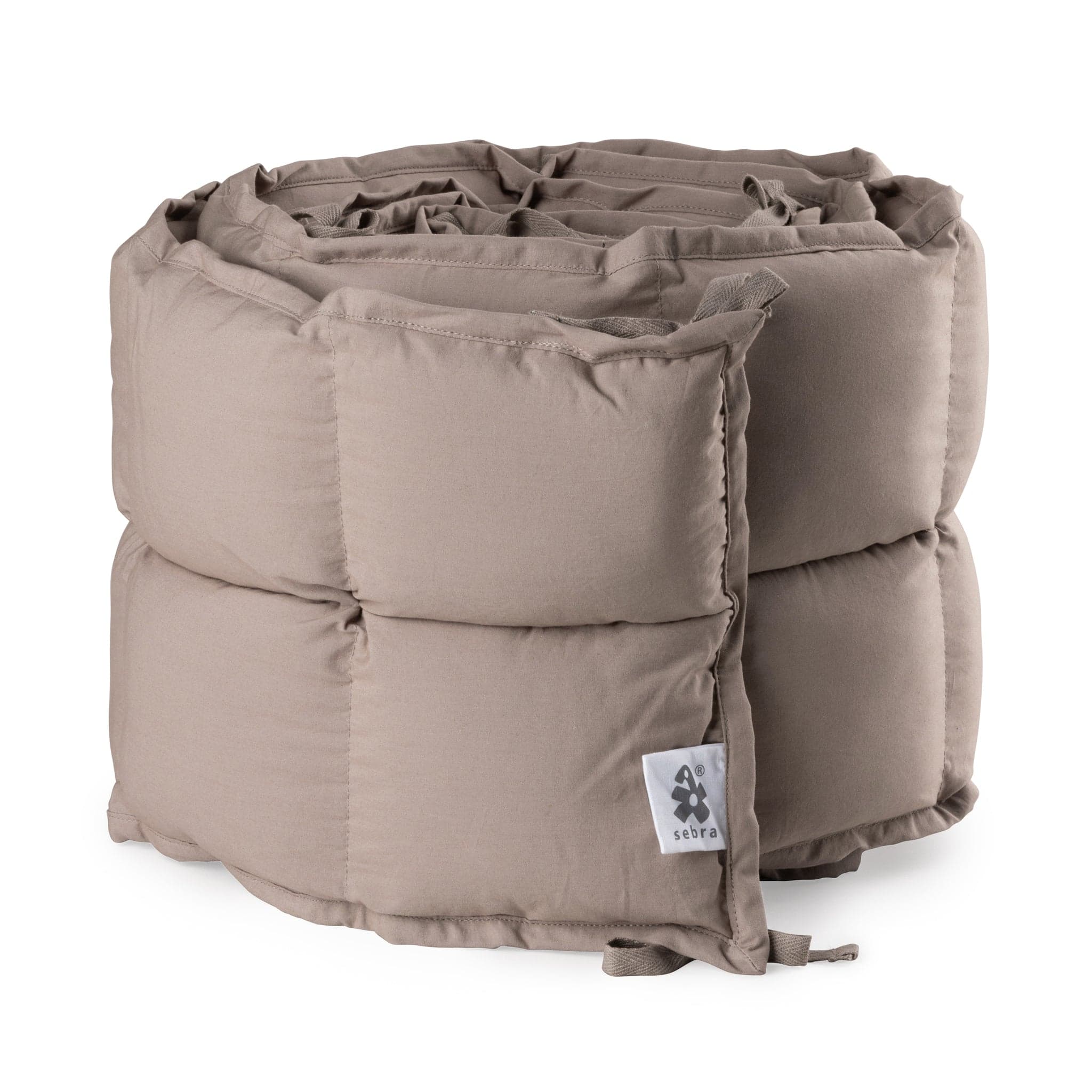 Sebra Baby Bumper in Jetty Beige - a natural and stylish nursery accessory.
