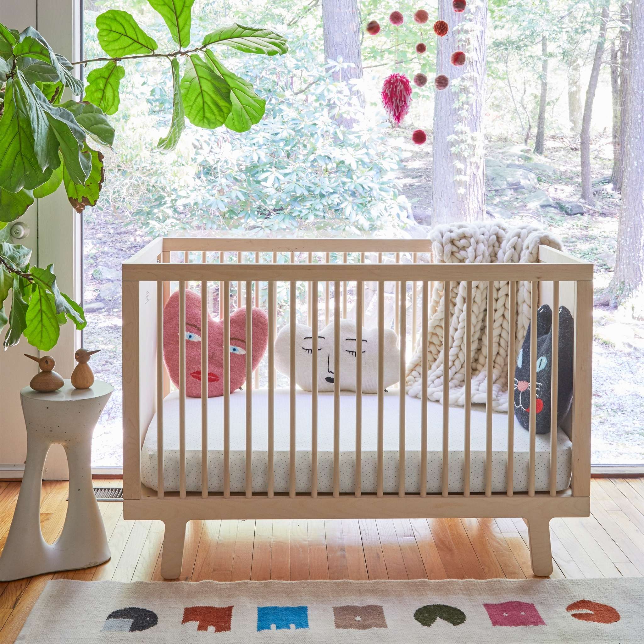 Oeuf NYC Sparrow Cot Bed in Birch, showcasing its minimalist design.