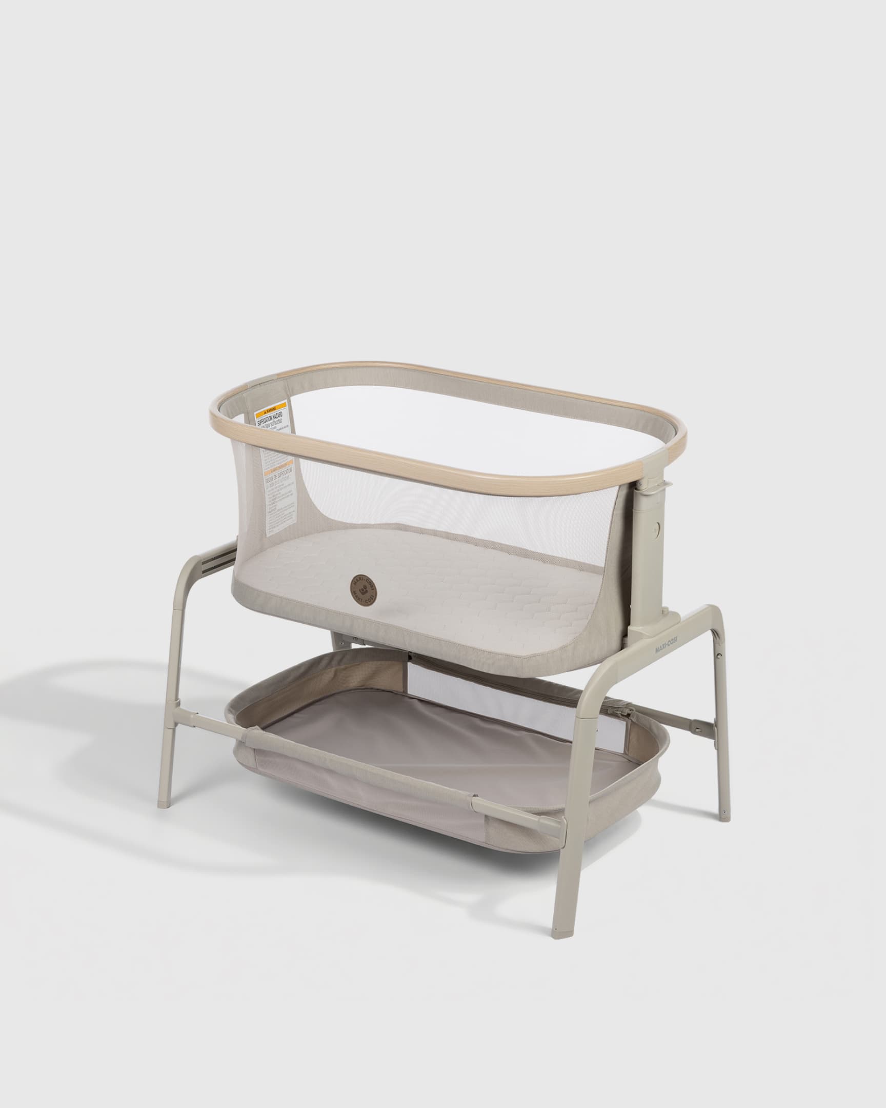 Iora Bedside Bassinet by Maxi-Cosi in a modern nursery setting.