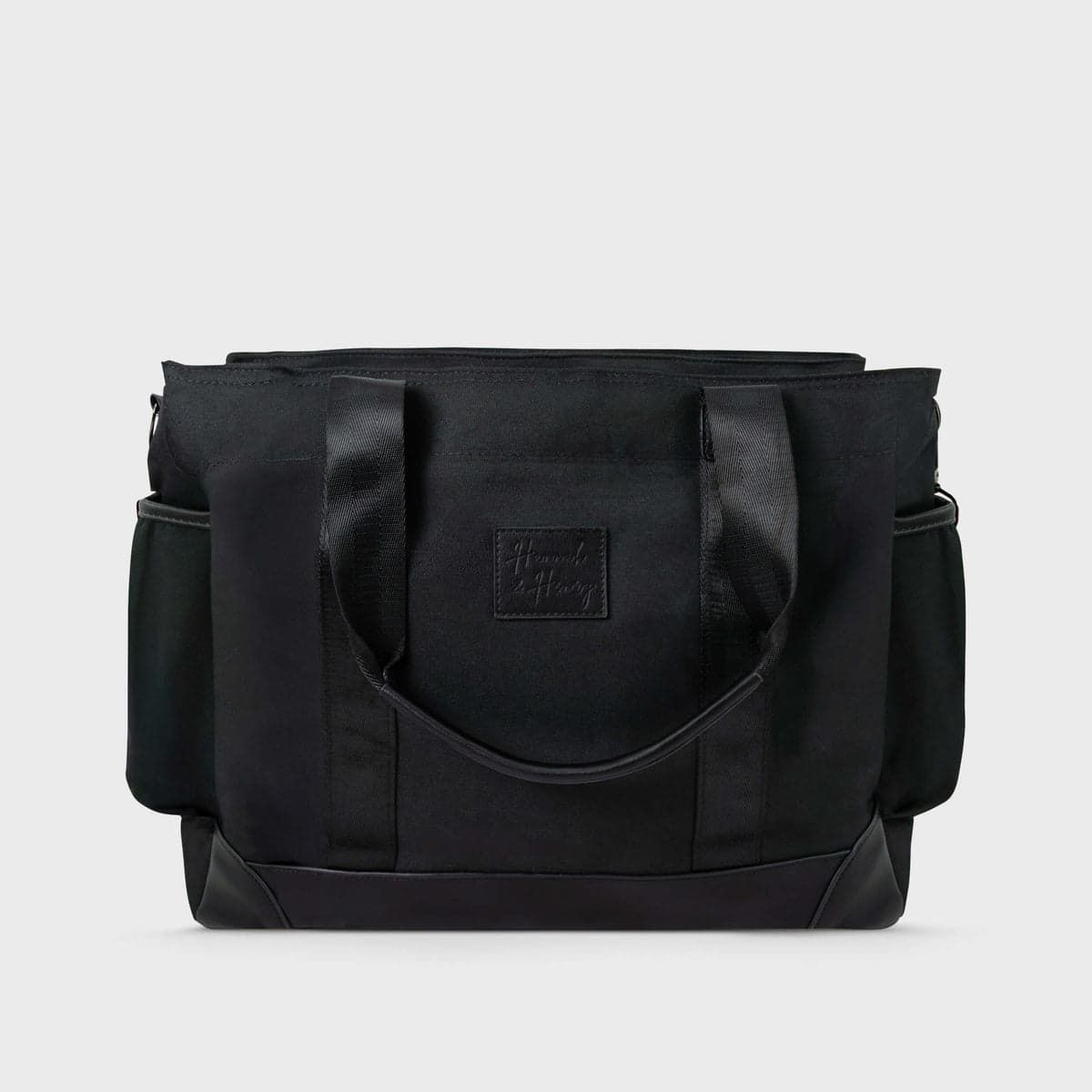 Charlie Diaper Bag Tote by Hannah and Henry, a spacious and stylish baby bag.