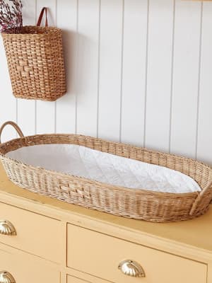 Bayu Rattan Changing Basket by Olli Ella, made from natural rattan.