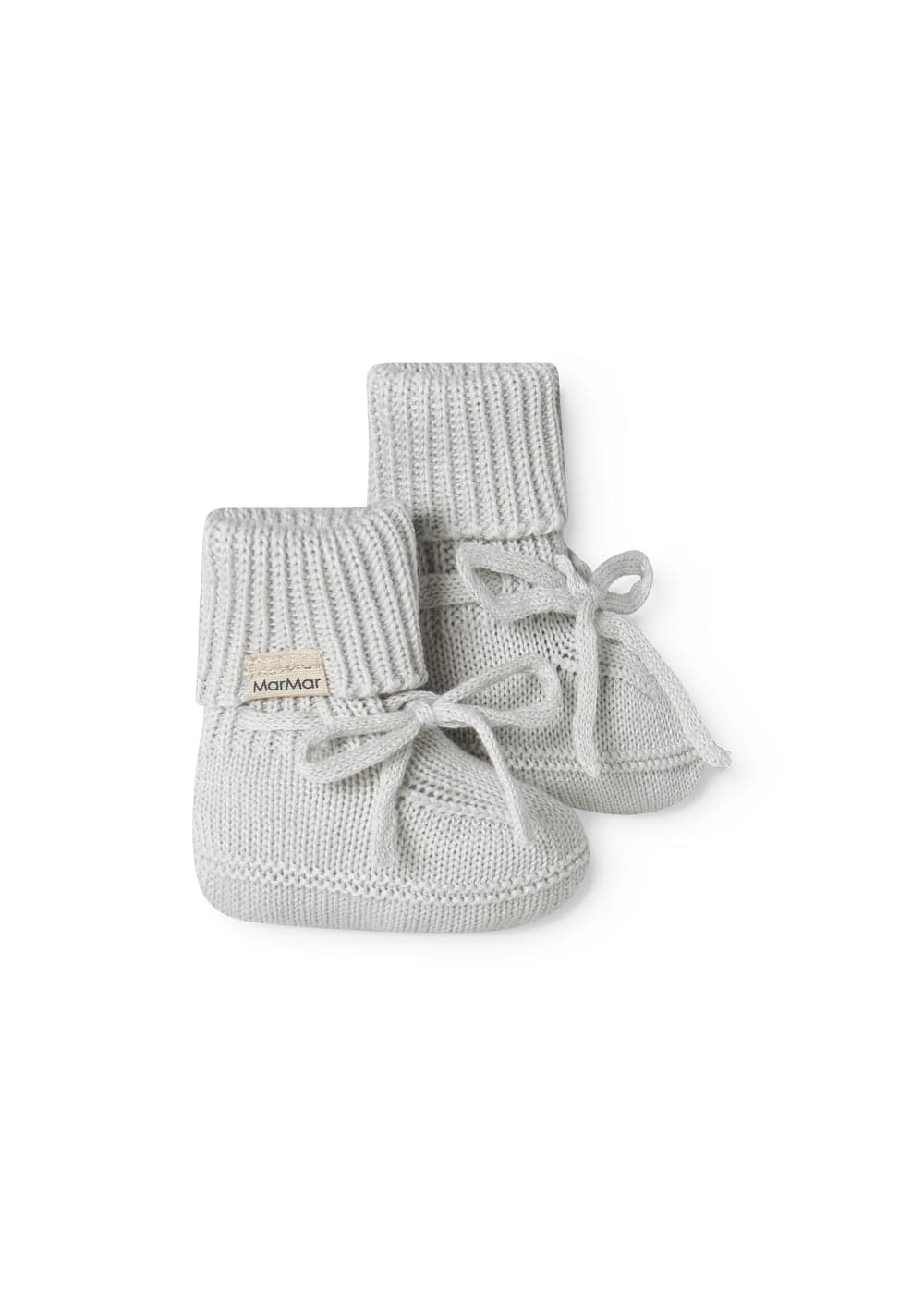 Light green knitted baby booties with ties from MarMar Copenhagen.