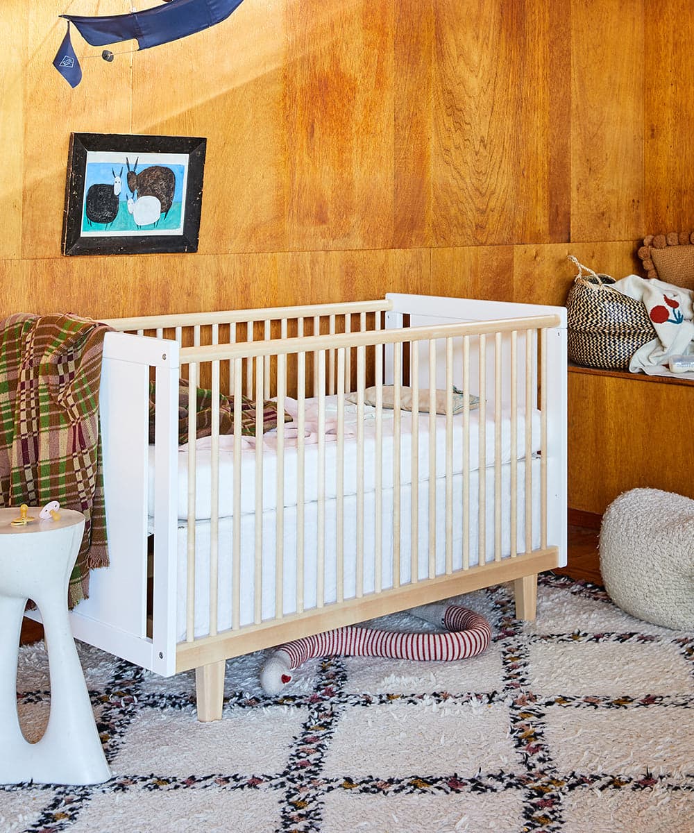 Rhea Crib by Oeuf, a sleek and modern baby crib.