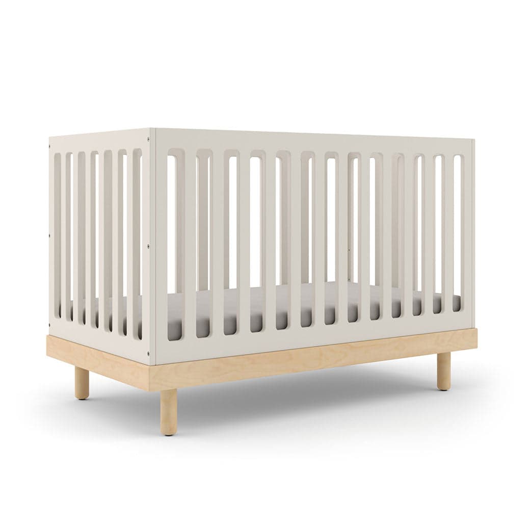 Oeuf Classic Crib in a serene nursery setting.
