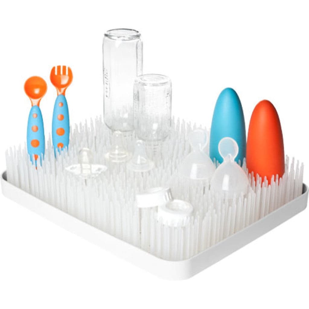 Boon Lawn Countertop Drying Rack with baby bottles drying.