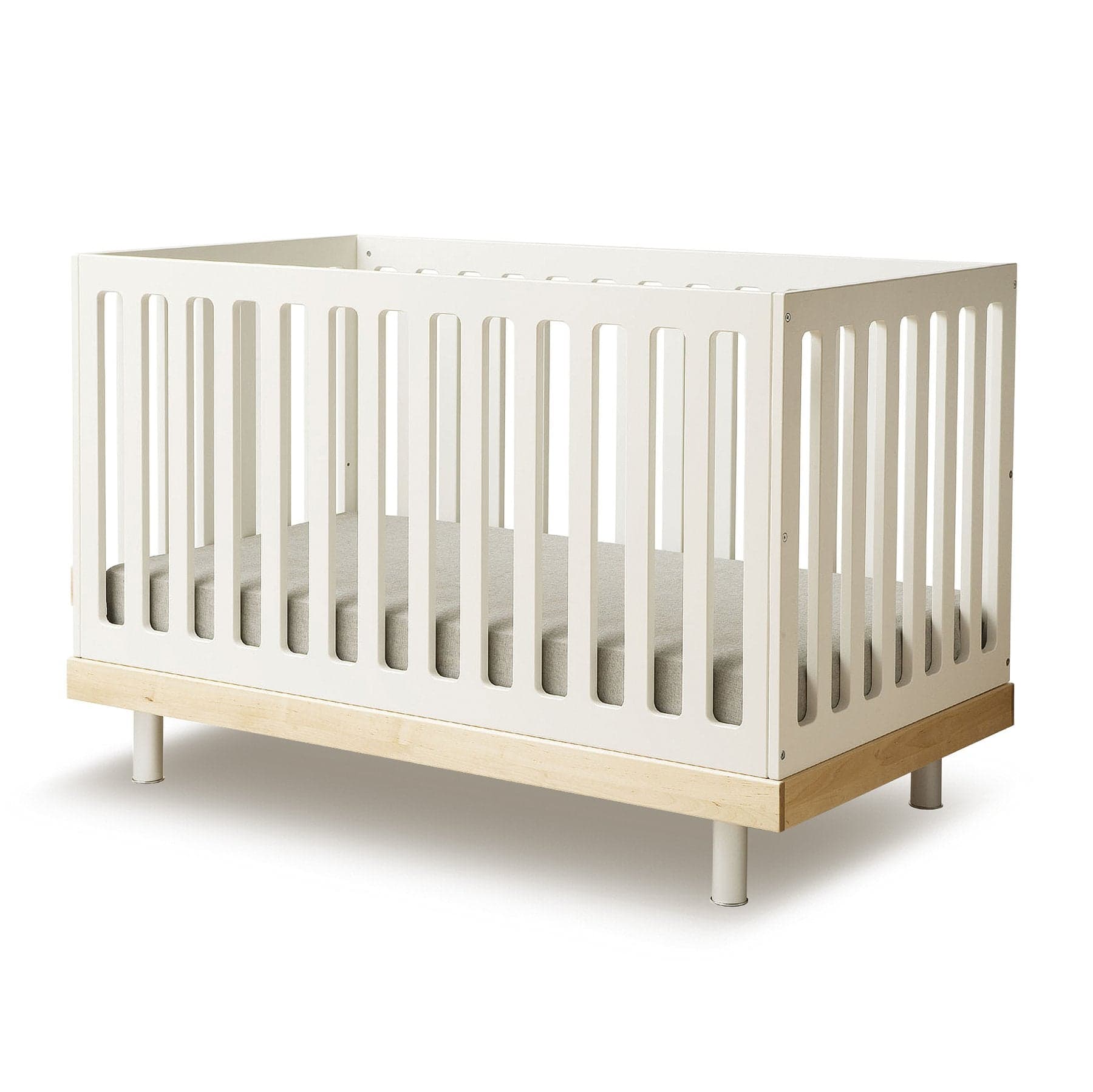 OEUF NYC Classic Cot Birch, a premium baby cot made from sustainable birch wood.