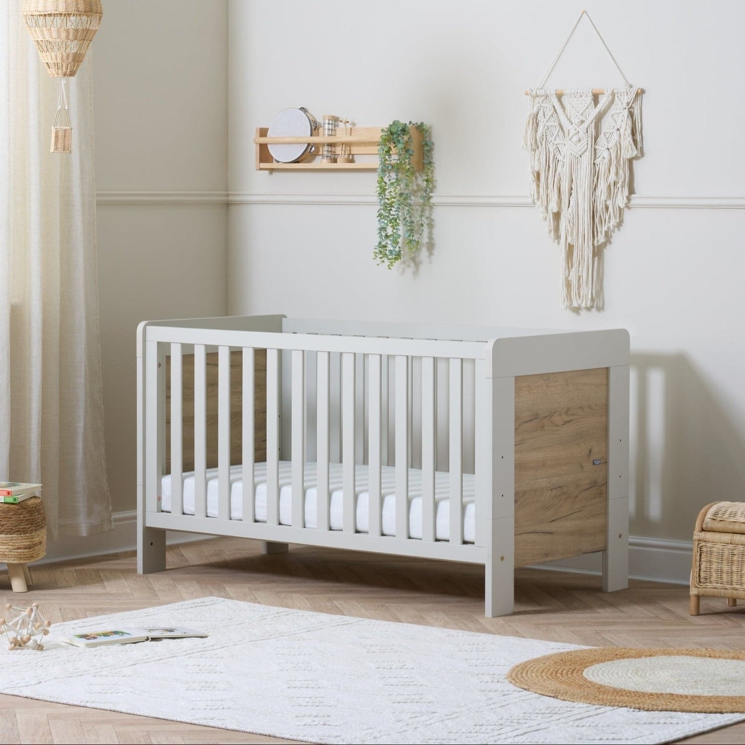 Essentials Alba Cot Bed by Tutti Bambini in a nursery setting.