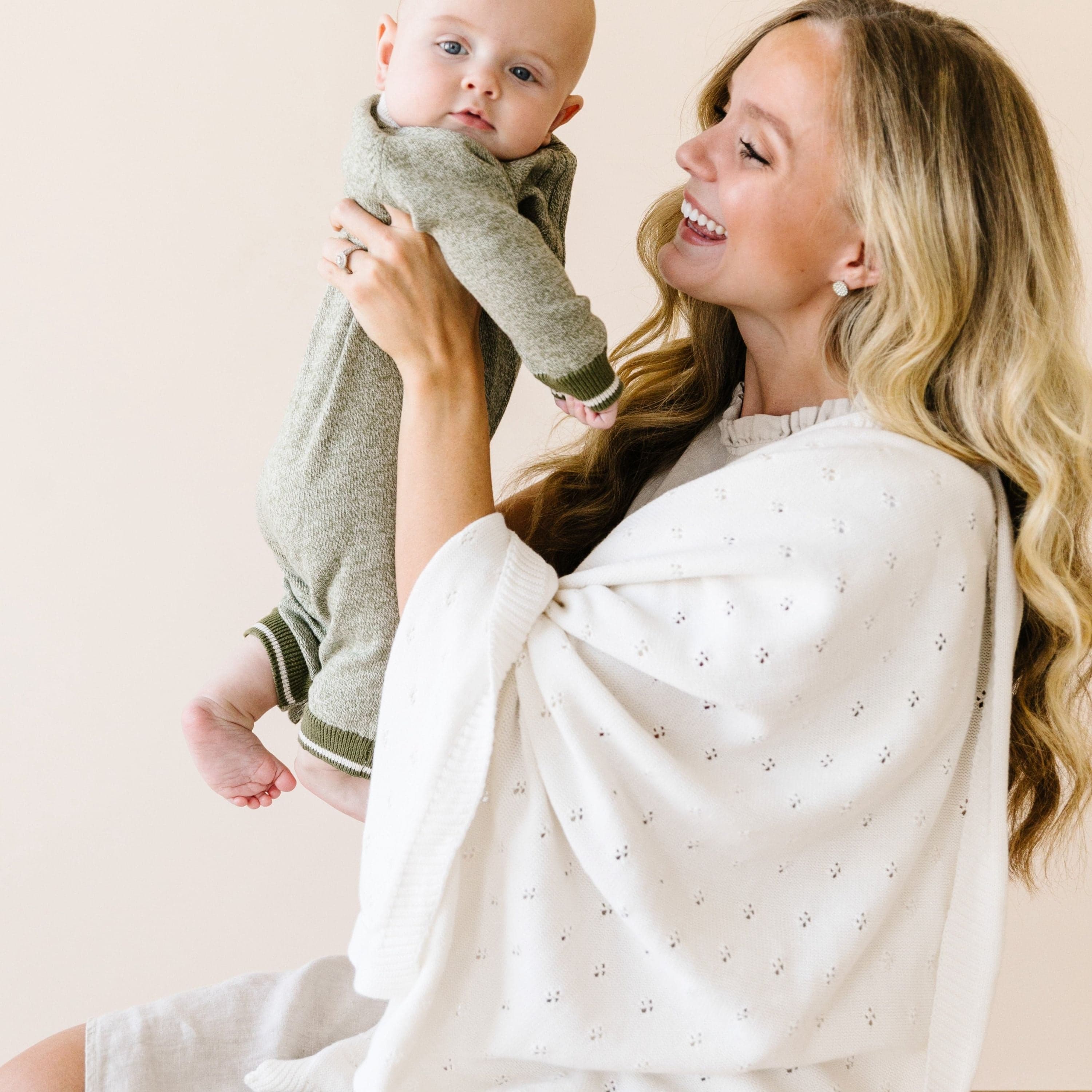 Ivory organic cotton pointelle knit baby blanket by Makemake Organics.