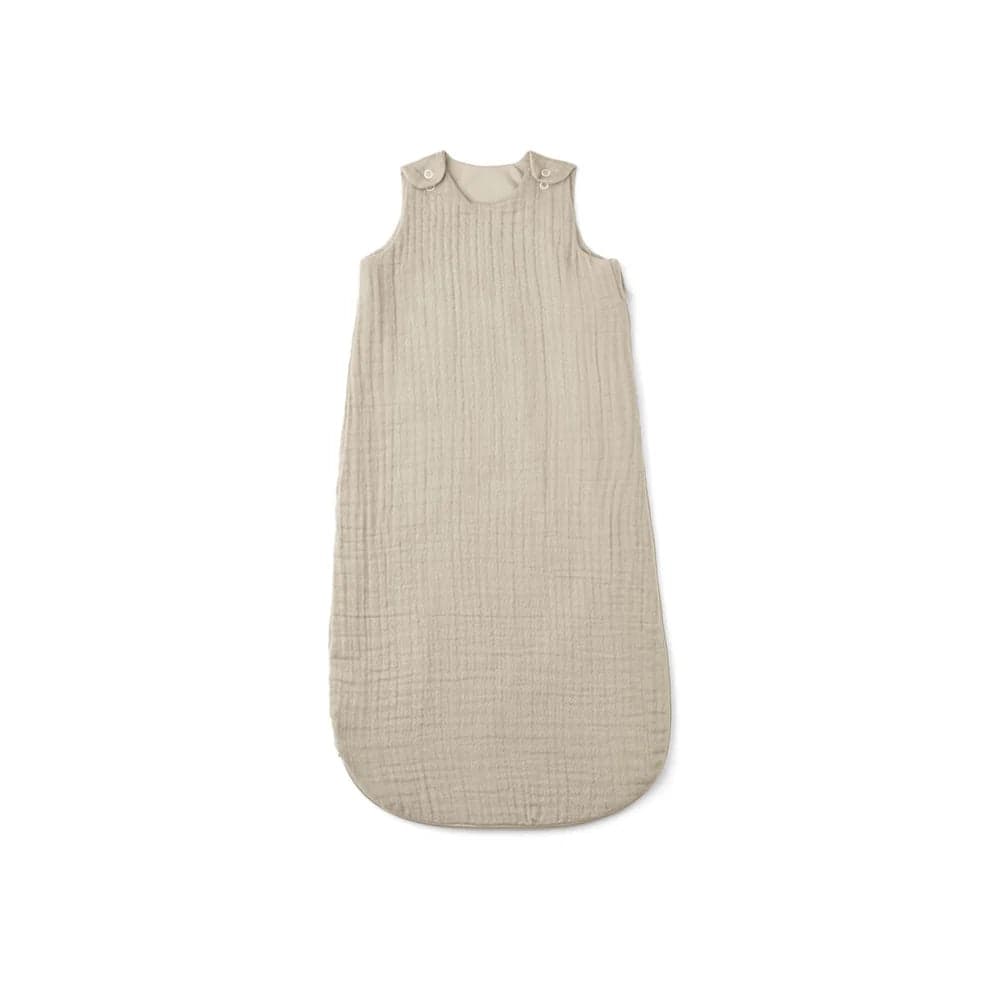 Liewood FLORA Sleeping Bag in sandy color, perfect for baby sleep.