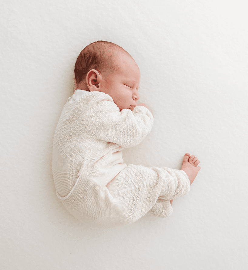 Swaddelini Organic Cotton Romper - Soft and breathable baby clothing.