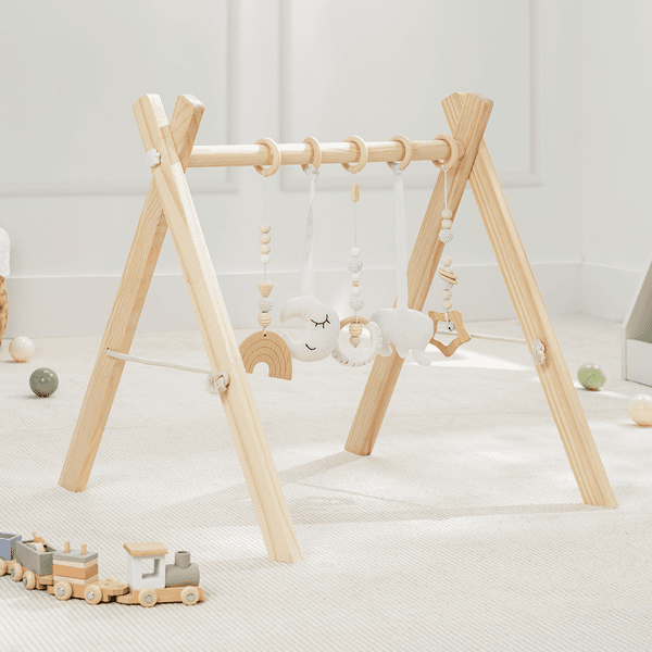 Natural wood Play Gym by Beluga Baby, designed for infant play.
