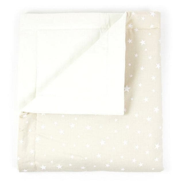 Laponia blanket by Nobodinoz featuring white stars design.